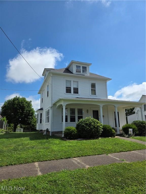 302 High St, Woodsfield, OH 43793 - view of front of property featuring a front lawn and covered porch