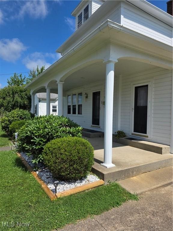302 High St, Woodsfield, OH 43793 - view of exterior entry with covered porch