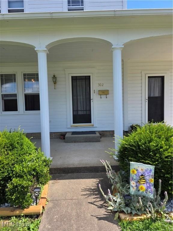 302 High St, Woodsfield, OH 43793 - entrance to property featuring a porch