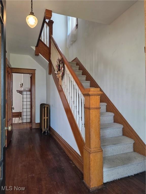 302 High St, Woodsfield, OH 43793 - staircase with hardwood / wood-style floors and vaulted ceiling