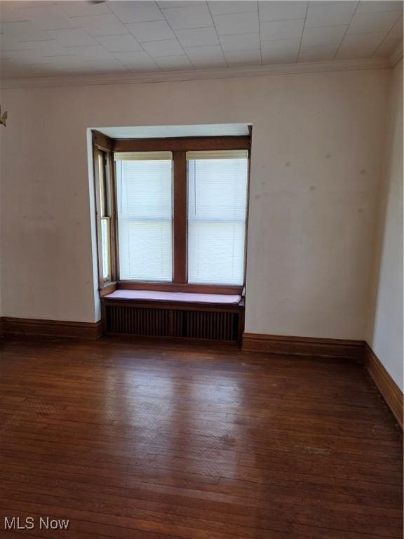 302 High St, Woodsfield, OH 43793 - unfurnished room with wood-type flooring, radiator, and ornamental molding