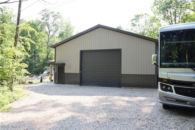 812 Spring Water Dr, Akron, OH 44333 - detached garage featuring driveway