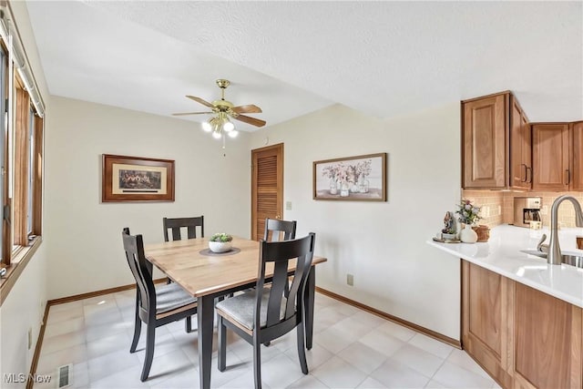 16891 Orchard Grove Dr Unit 16B, Middleburg Heights, OH 44130 - dining space featuring a ceiling fan, light flooring, and a textured ceiling