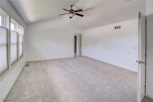 1741 Hamilton Dr, Broadview Heights, OH 44147 - spare room with ceiling fan, vaulted ceiling, and light colored carpet