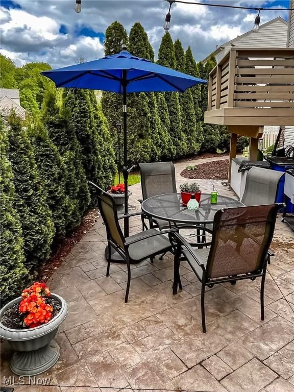 1741 Hamilton Dr, Broadview Heights, OH 44147 - view of patio / terrace with outdoor dining space and a wooden deck