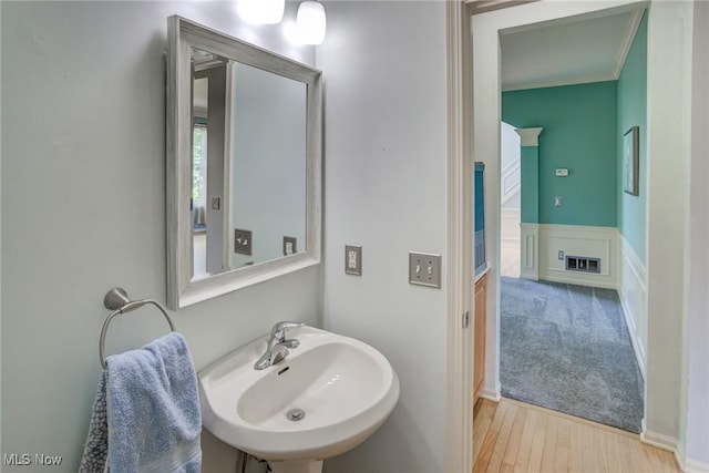1741 Hamilton Dr, Broadview Heights, OH 44147 - bathroom with wood finished floors and a wainscoted wall