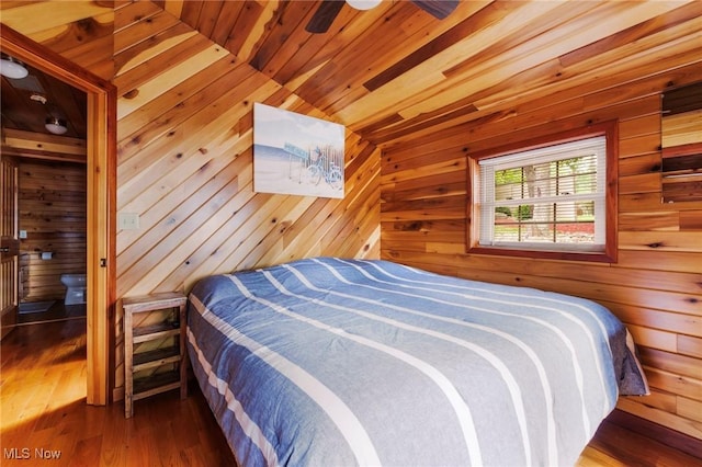 7235 Spillway Rd, Lisbon, OH 44408 - bedroom featuring wooden walls, wood finished floors, and wooden ceiling