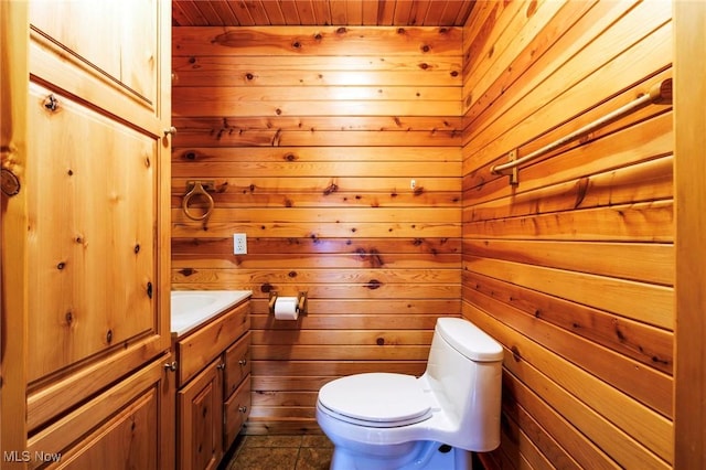 7235 Spillway Rd, Lisbon, OH 44408 - half bathroom with vanity, wooden walls, and wooden ceiling