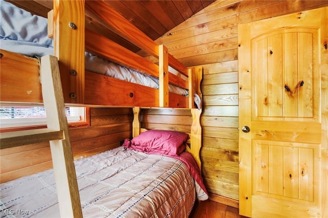 7235 Spillway Rd, Lisbon, OH 44408 - bedroom with wooden walls, vaulted ceiling, wood finished floors, and wooden ceiling