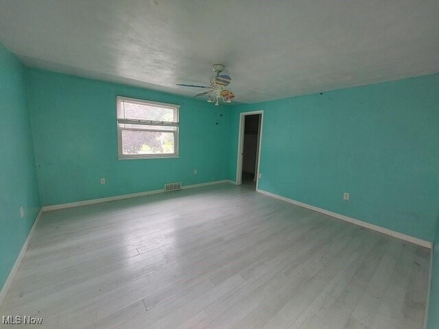 4985 State Route 213, Toronto, OH 43964 - spare room with wood finished floors and ceiling fan
