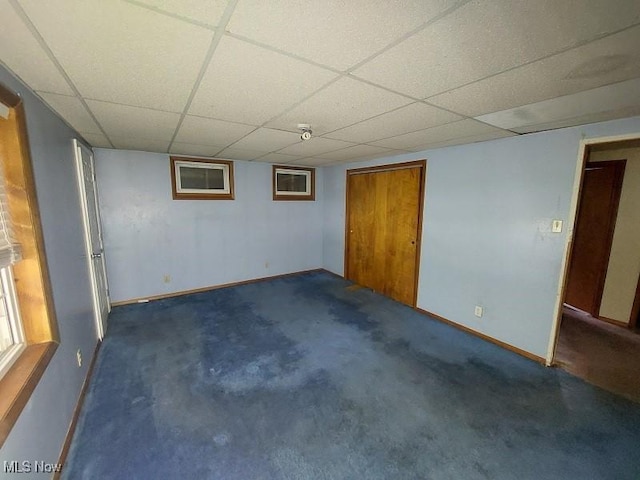 4985 State Route 213, Toronto, OH 43964 - finished basement with a paneled ceiling and dark colored carpet