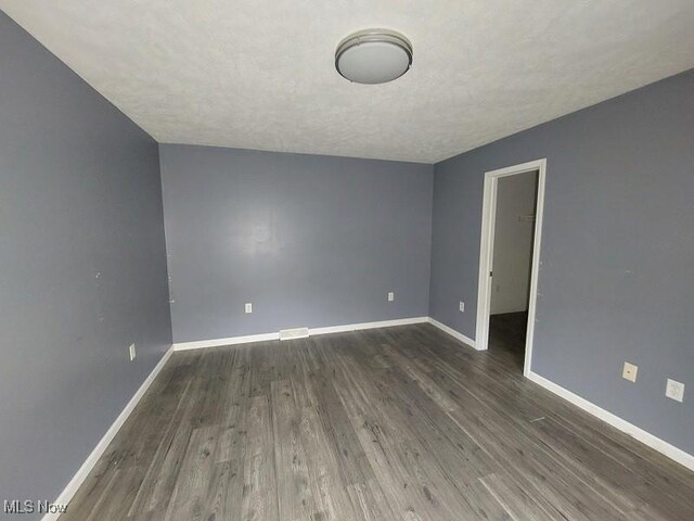 4985 State Route 213, Toronto, OH 43964 - empty room featuring wood finished floors and baseboards