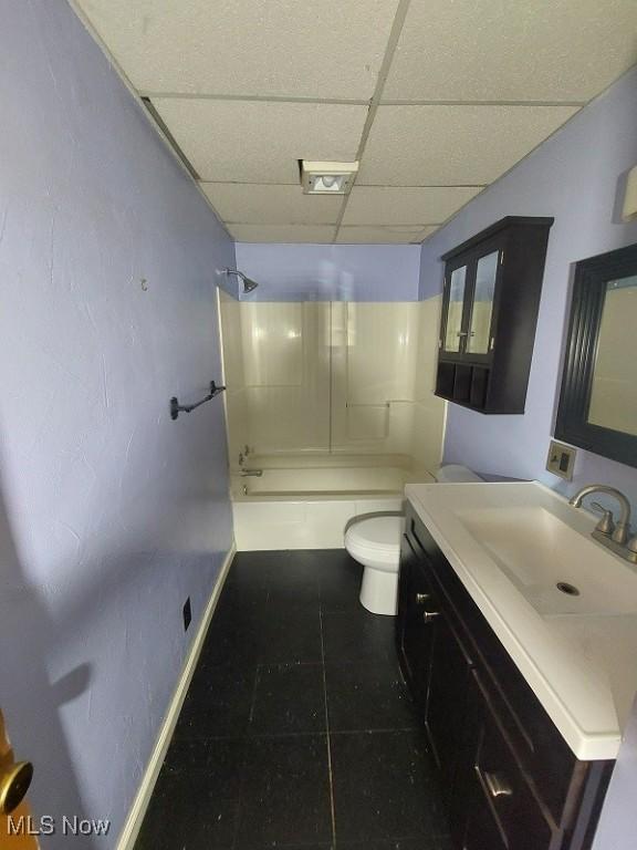4985 State Route 213, Toronto, OH 43964 - full bath featuring a drop ceiling, vanity, shower / tub combination, and tile patterned floors