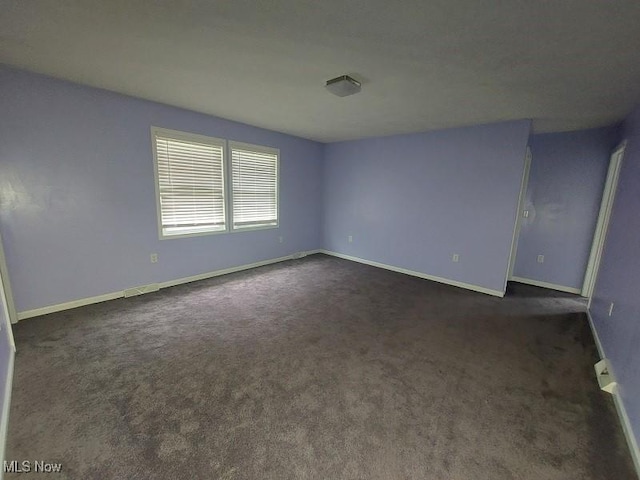 4985 State Route 213, Toronto, OH 43964 - unfurnished room with dark colored carpet