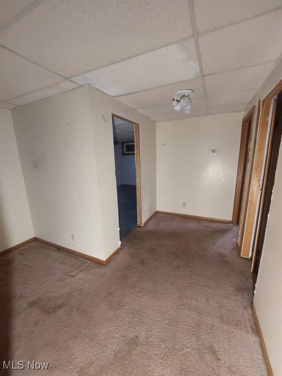 4985 State Route 213, Toronto, OH 43964 - spare room with a paneled ceiling and carpet