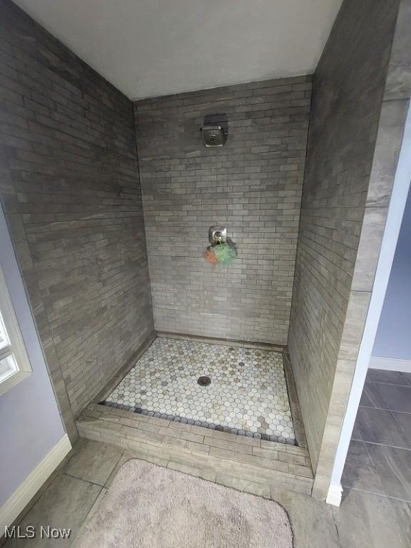 4985 State Route 213, Toronto, OH 43964 - full bathroom with tile patterned flooring and tiled shower