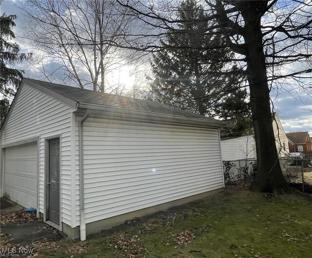 20520 Ball Ave, Euclid, OH 44123 - view of home's exterior with a garage and an outdoor structure