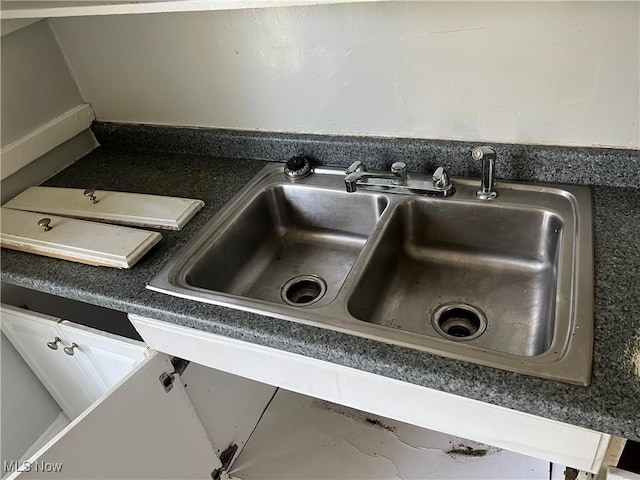 20520 Ball Ave, Euclid, OH 44123 - kitchen view of a sink and dark countertops