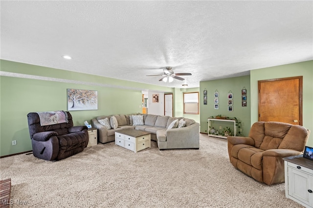 34765 Roberts Rd, Eastlake, OH 44095 - living room featuring ceiling fan, light colored carpet, and a textured ceiling