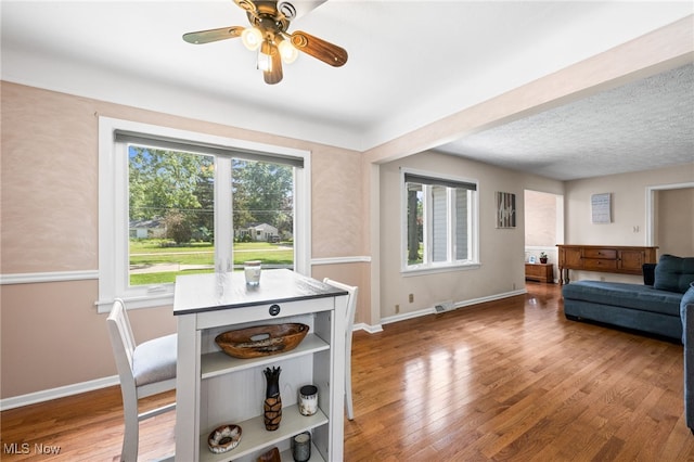 34765 Roberts Rd, Eastlake, OH 44095 - dining room featuring wood finished floors and ceiling fan