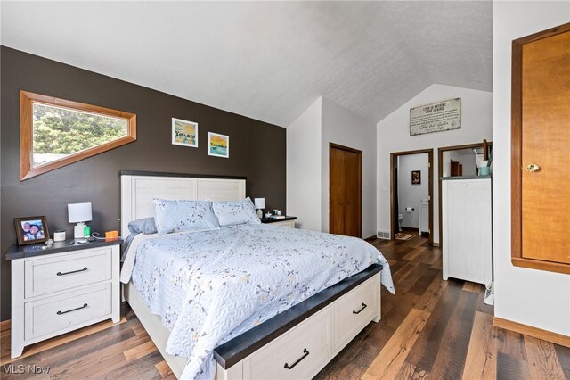 34765 Roberts Rd, Eastlake, OH 44095 - bedroom with vaulted ceiling and dark wood-type flooring