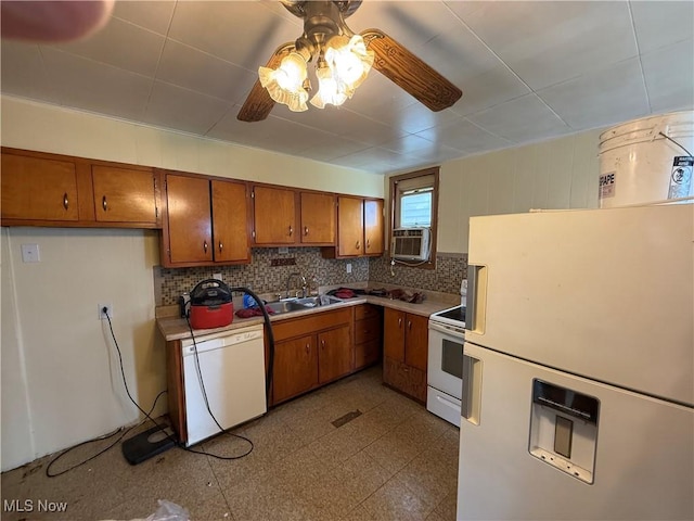 224 Shamrock Ave, Mingo Junction, OH 43938 - kitchen featuring white appliances, brown cabinetry, a ceiling fan, and decorative backsplash
