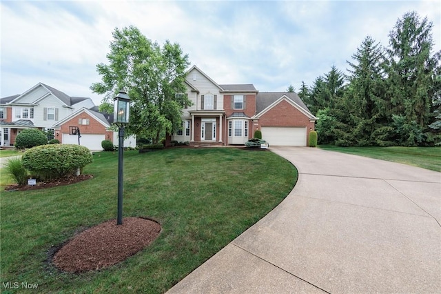 100 Hartford Ct, Broadview Heights, OH 44147 - traditional-style home featuring driveway, an attached garage, and a front yard