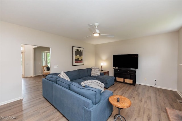 100 Hartford Ct, Broadview Heights, OH 44147 - living room featuring a ceiling fan and light wood finished floors
