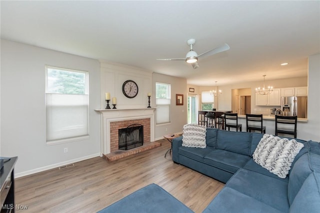 100 Hartford Ct, Broadview Heights, OH 44147 - living area with a chandelier, plenty of natural light, a ceiling fan, light wood-type flooring, and recessed lighting