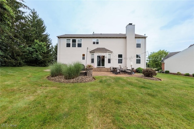 100 Hartford Ct, Broadview Heights, OH 44147 - rear view of house with a patio area, entry steps, and a lawn