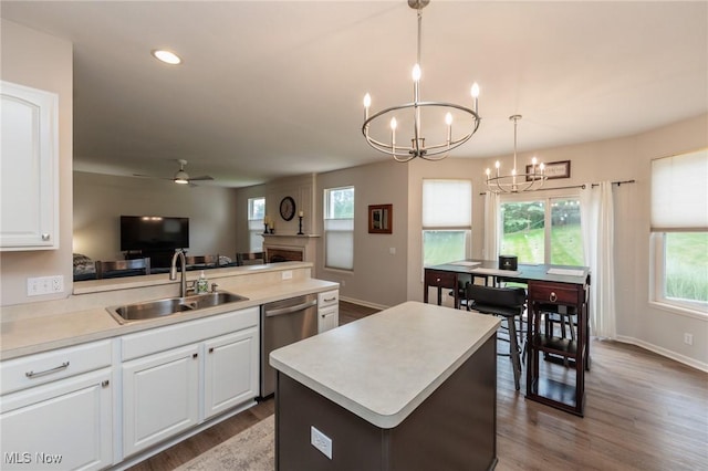 100 Hartford Ct, Broadview Heights, OH 44147 - kitchen featuring stainless steel dishwasher, a chandelier, dark wood-style floors, light countertops, and recessed lighting