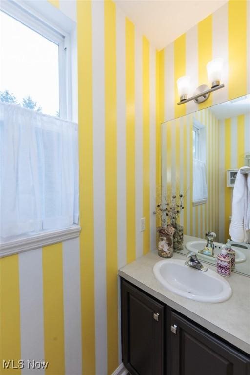 100 Hartford Ct, Broadview Heights, OH 44147 - bathroom with wallpapered walls and vanity