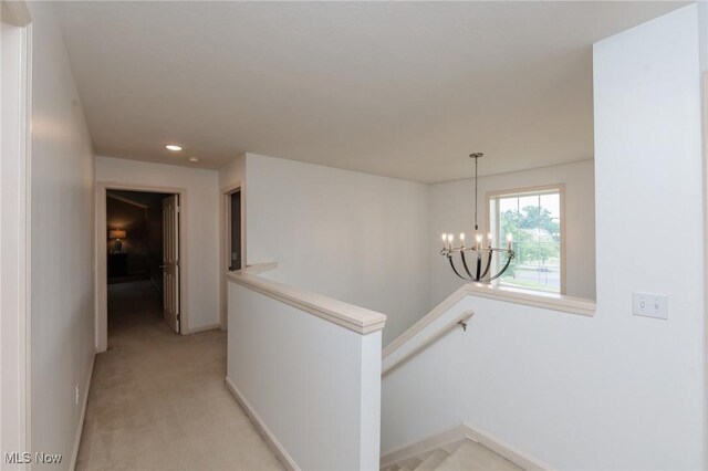 100 Hartford Ct, Broadview Heights, OH 44147 - hallway featuring an upstairs landing, a chandelier, light colored carpet, and recessed lighting