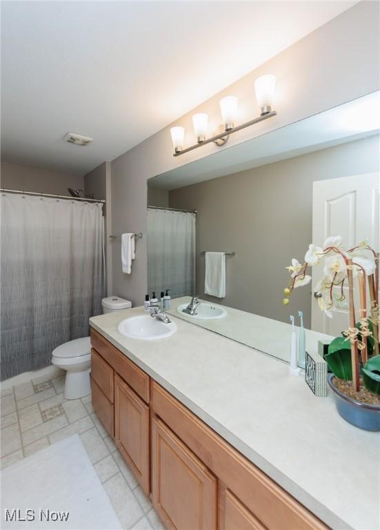 100 Hartford Ct, Broadview Heights, OH 44147 - full bathroom featuring vanity and toilet