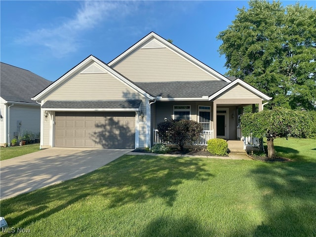 10517 W Ravine View Ct, North Royalton, OH 44133 - view of front of property featuring a garage, concrete driveway, a front lawn, a porch, and roof with shingles