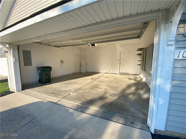10517 W Ravine View Ct, North Royalton, OH 44133 - garage with electric panel and a garage door opener