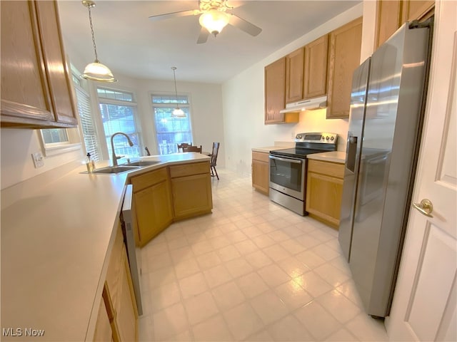 10517 W Ravine View Ct, North Royalton, OH 44133 - kitchen with stainless steel appliances, under cabinet range hood, a peninsula, ceiling fan, and decorative light fixtures