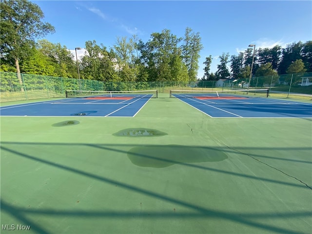 10517 W Ravine View Ct, North Royalton, OH 44133 - view of tennis court featuring community basketball court and view of wooded area