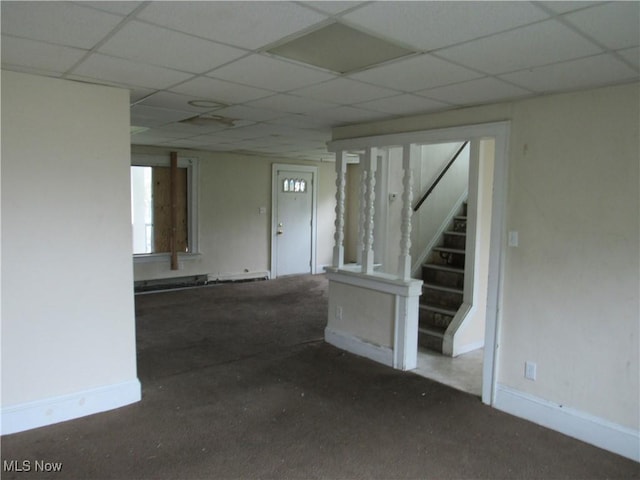 3298 E 143rd St, Cleveland, OH 44120 - unfurnished room featuring stairs and a paneled ceiling