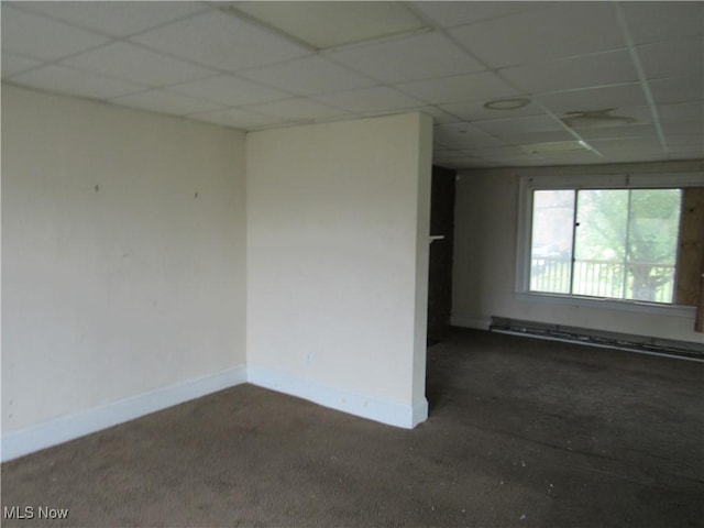 3298 E 143rd St, Cleveland, OH 44120 - carpeted spare room featuring a paneled ceiling and baseboard heating