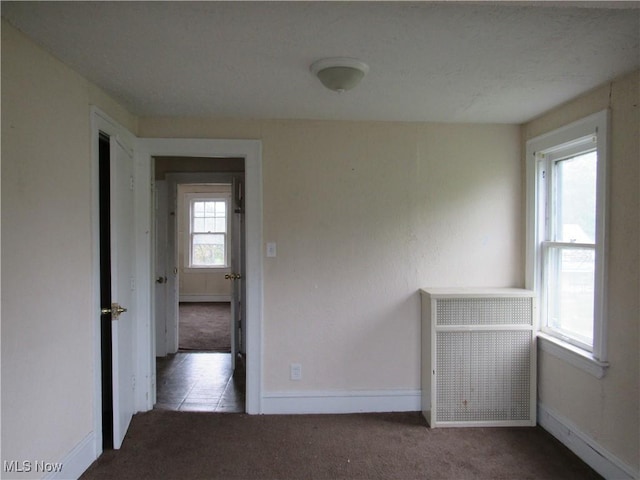 3298 E 143rd St, Cleveland, OH 44120 - carpeted spare room with baseboards