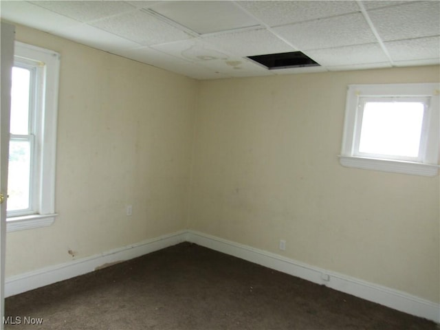 3298 E 143rd St, Cleveland, OH 44120 - unfurnished room with a drop ceiling and dark carpet
