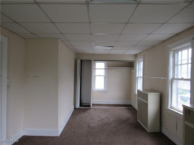 3298 E 143rd St, Cleveland, OH 44120 - unfurnished bedroom with carpet flooring, a drop ceiling, and a closet
