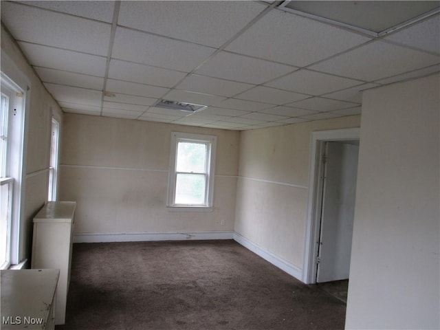 3298 E 143rd St, Cleveland, OH 44120 - spare room featuring carpet flooring and a paneled ceiling