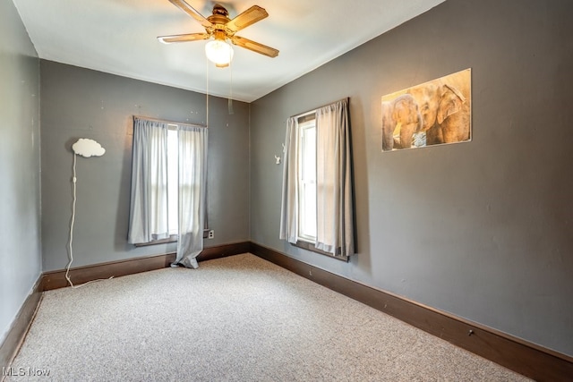 516 Floyd St, Akron, OH 44310 - unfurnished room featuring carpet and ceiling fan