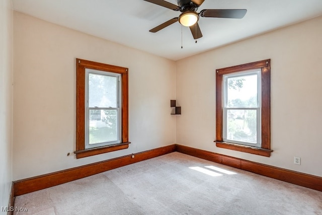 516 Floyd St, Akron, OH 44310 - carpeted empty room featuring baseboards and ceiling fan