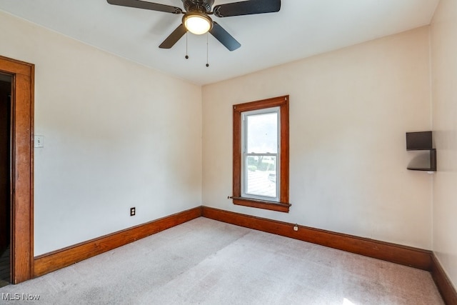 516 Floyd St, Akron, OH 44310 - empty room featuring carpet floors and ceiling fan