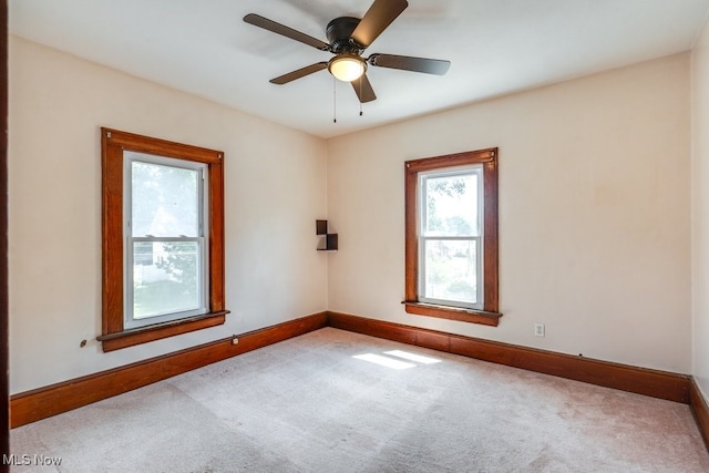 516 Floyd St, Akron, OH 44310 - empty room featuring carpet floors and ceiling fan