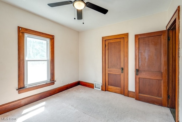 516 Floyd St, Akron, OH 44310 - unfurnished bedroom with carpet and a ceiling fan