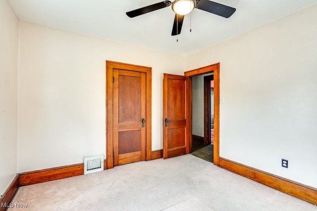 516 Floyd St, Akron, OH 44310 - unfurnished bedroom with carpet and ceiling fan